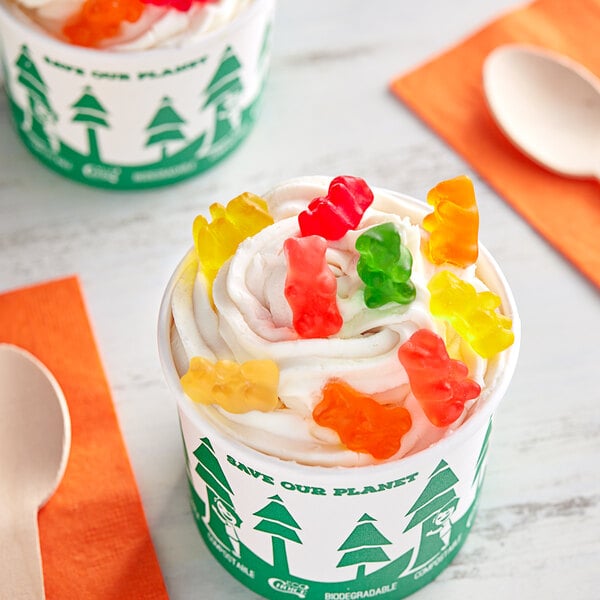 A cup of ice cream with Kervan gummy bears on top.