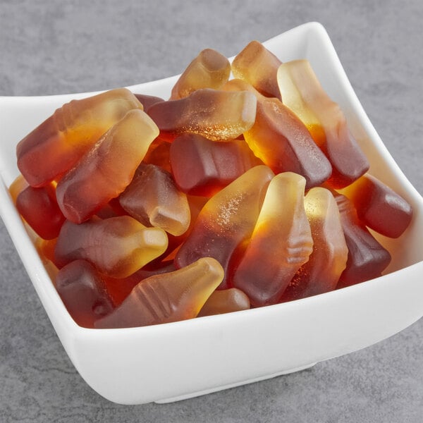 A bowl of Kervan Gummy Cola Bottles.