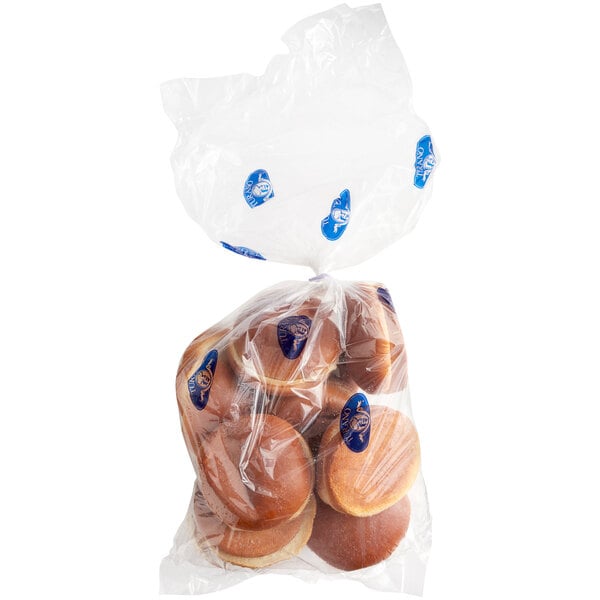 A bag of Turano 4 1/2" Sliced Brioche Buns in a plastic bag.