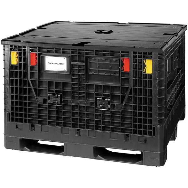 A black Quantum collapsible lid for a bulk box with yellow and red labels.