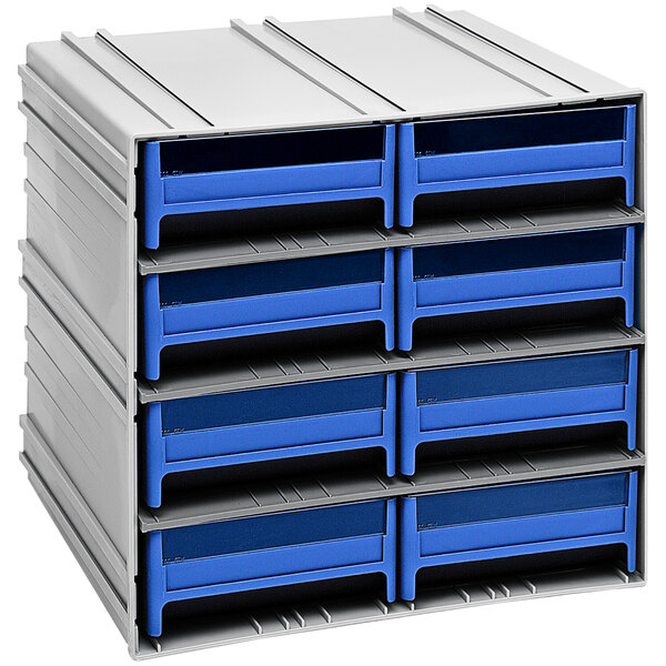 A stack of blue and grey plastic drawers.