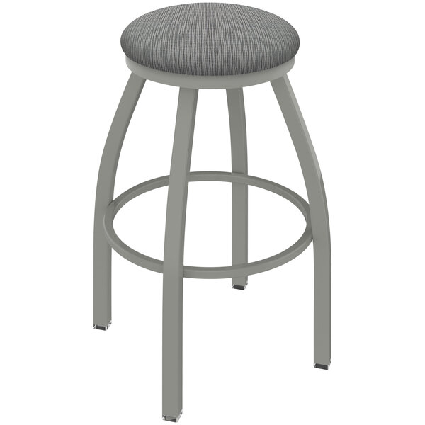 A Holland Bar Stool Misha Ladderback Swivel Bar Stool with a Graph Alpine seat.
