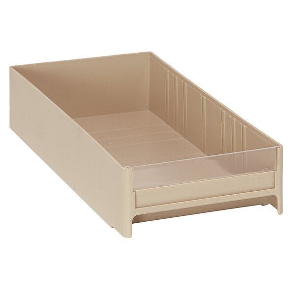 A beige plastic drawer for Quantum interlocking cabinets.