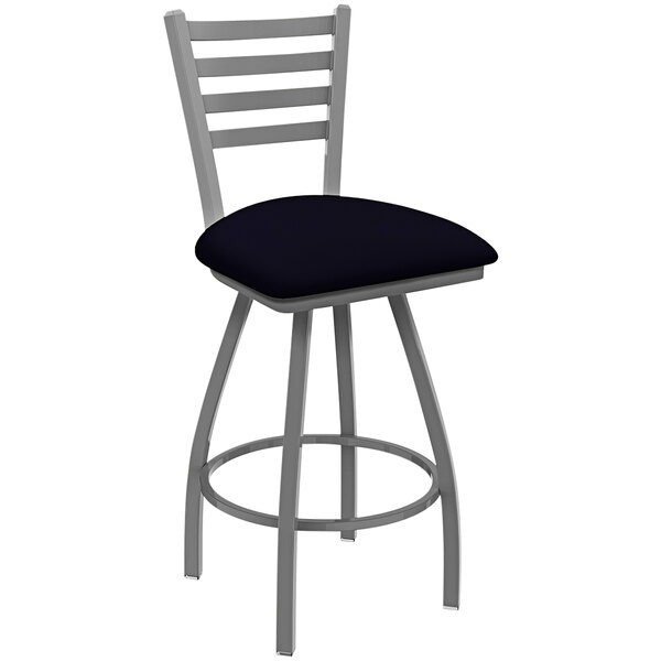 A Holland Barstool black ladderback bar stool with a gray cushion.