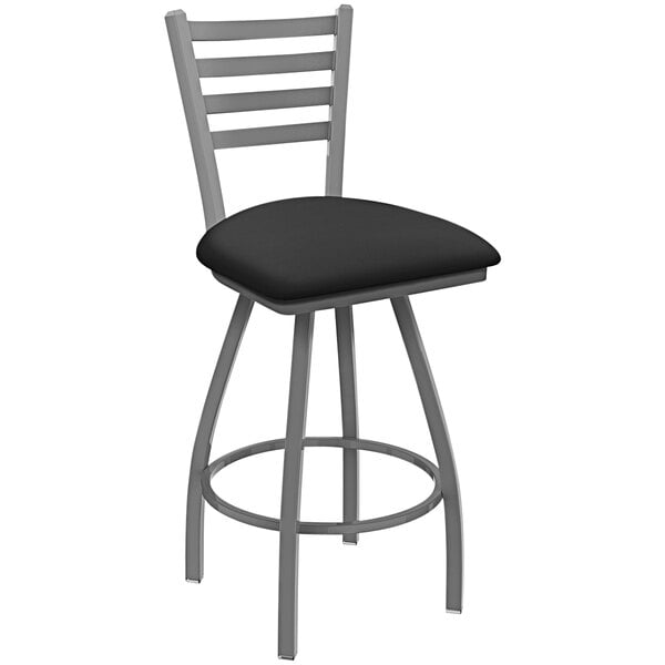 A Holland Barstool black ladderback swivel bar stool with a gray cushion.