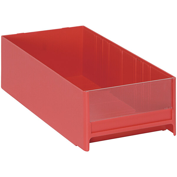 A red plastic Quantum drawer for industrial storage with a clear bottom.