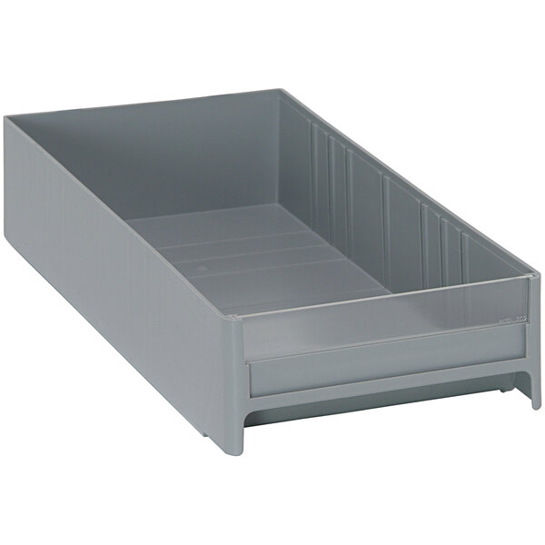 A grey plastic drawer for Quantum interlocking cabinets.