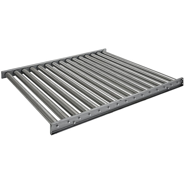 A steel roller conveyor with a metal grid of steel bars and holes.