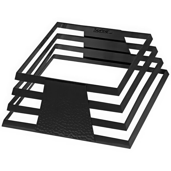 A stack of Spring USA black square metal display towers with a hammered finish.
