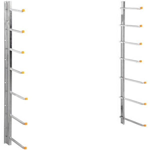 A metal rack with orange handles.