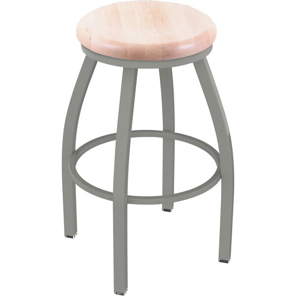 A Holland Bar Stool restaurant bar stool with a natural maple wooden seat and anodized nickel metal base and back.