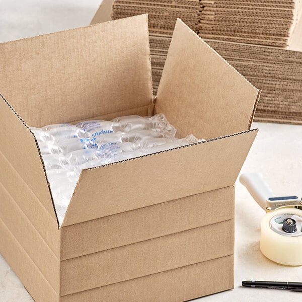 A Lavex kraft cardboard shipping box with plastic bottles inside.