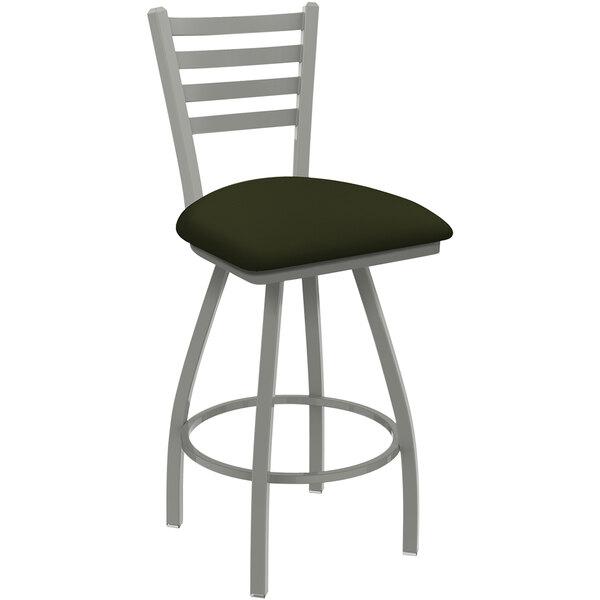 A Holland Bar Stool Jackie ladderback counter stool with a green cushion.