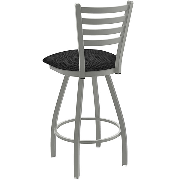 A Holland Bar Stool Jackie ladderback counter stool with a black and gray padded seat.