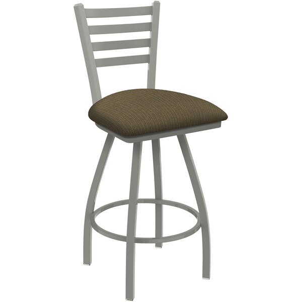 A Holland Bar Stool Jackie Ladderback Swivel Bar Stool with a brown cork seat.