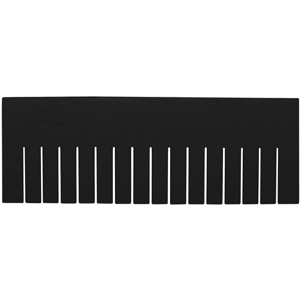 A black rectangular object with white lines.