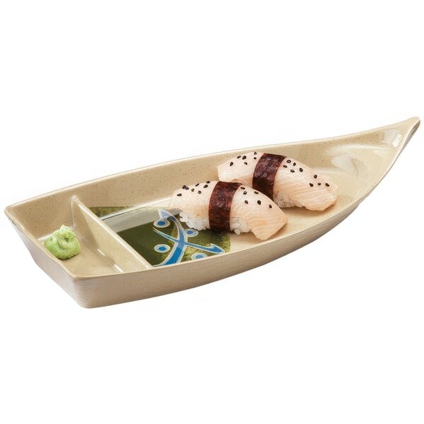 A GET Japanese Traditional boat shaped melamine plate with sushi and a roll.