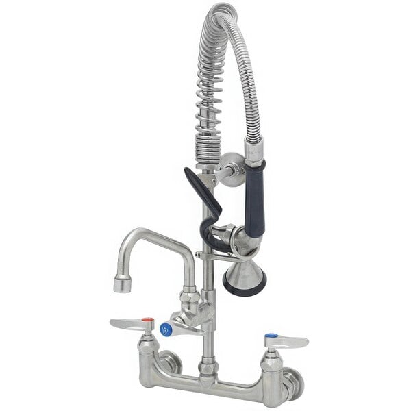 A silver stainless steel wall mount pre-rinse faucet with a swing nozzle and mini pre-rinse unit.