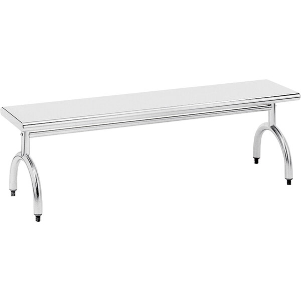 A long silver rectangular stainless steel bench with legs.