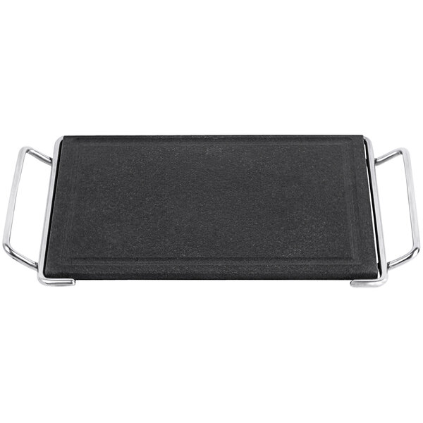 A black granite slab with metal handles.