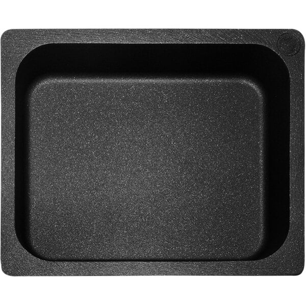 A black rectangular Mibrasa cast aluminum roasting tray.