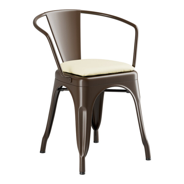 A brown metal Lancaster Table & Seating arm chair with a white cushion.