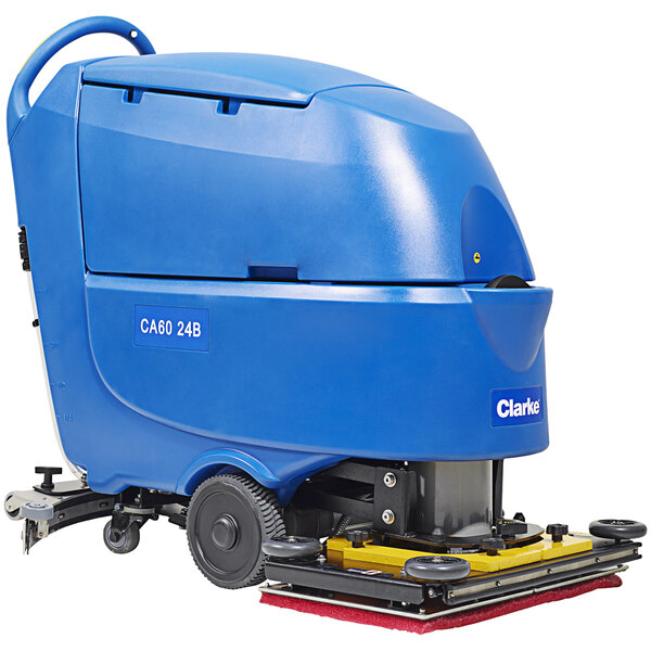 A blue Clarke walk behind floor scrubber with wheels.