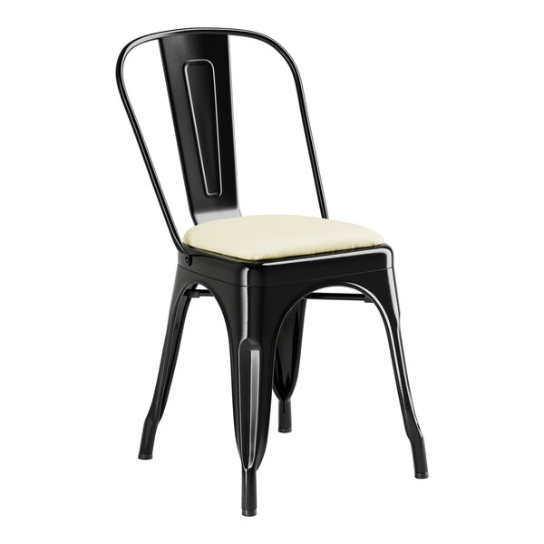 A Lancaster Table & Seating black metal restaurant chair with a white cushion.