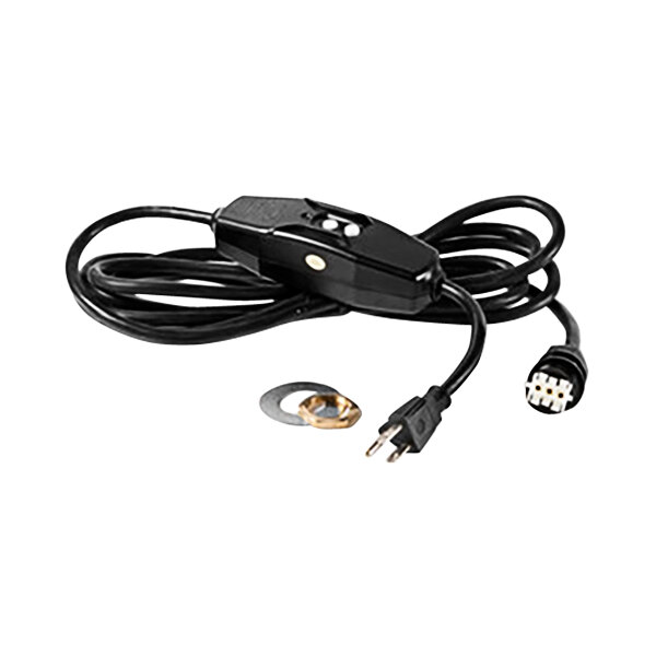 A black electrical cord with a round metal nut and a gold plug.
