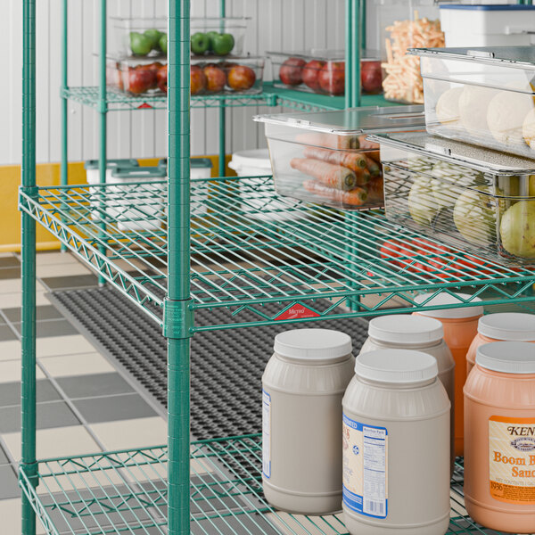 A green wire shelf used for storage, measuring 36 inches by 72 inches.