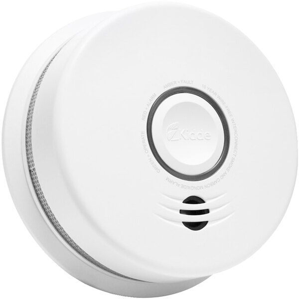 A white Kidde smoke detector with a round white circle on it.