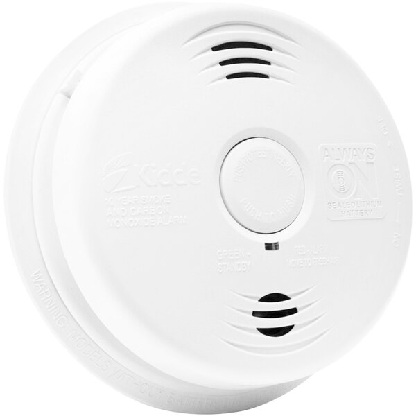 A Kidde hardwired smoke and carbon monoxide alarm with a round white lid.
