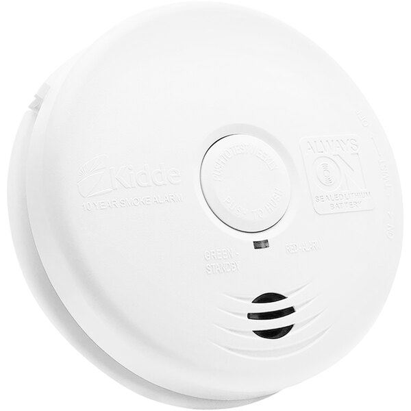 A Kidde white circular smoke detector with a round base.