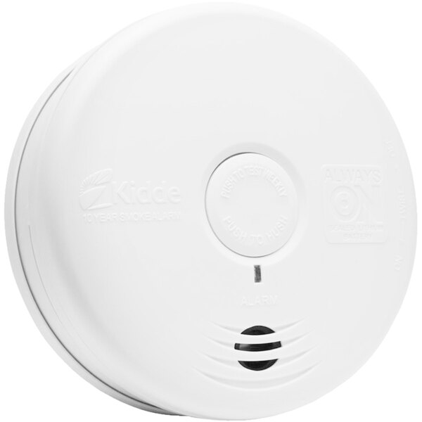 A Kidde white smoke detector with a round lid.