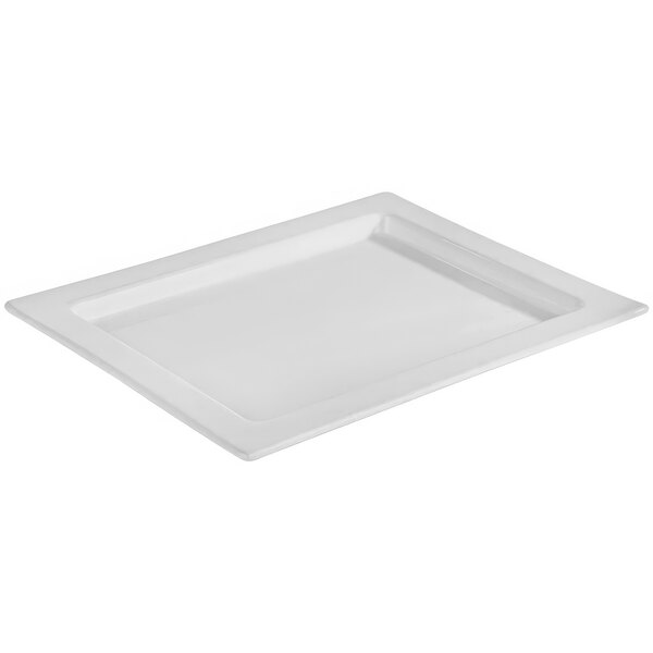 A white rectangular porcelain tray with a white border.