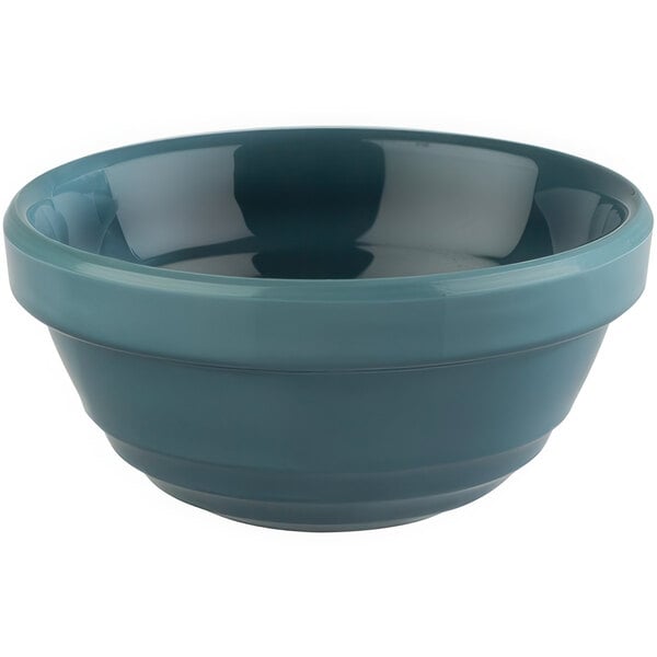 A blue melamine bowl with a blue rim.