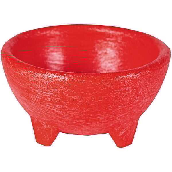 A red polypropylene molcajete with three legs.