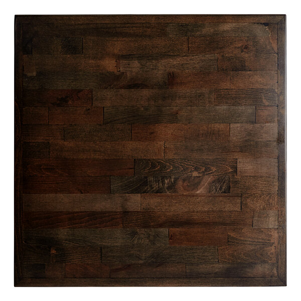 A square wooden butcher block table with an espresso finish.