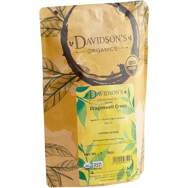 A bag of Davidson's Organic Dragonwell Green Loose Leaf Tea on a counter with a label.