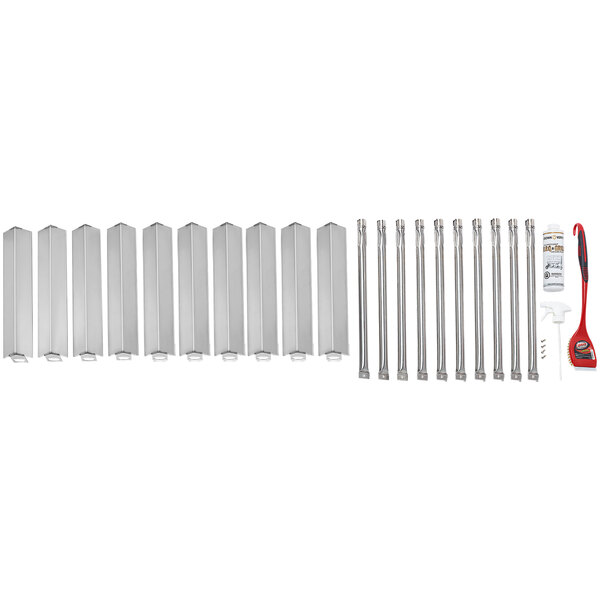A white set of Crown Verity grill tools and a knife.