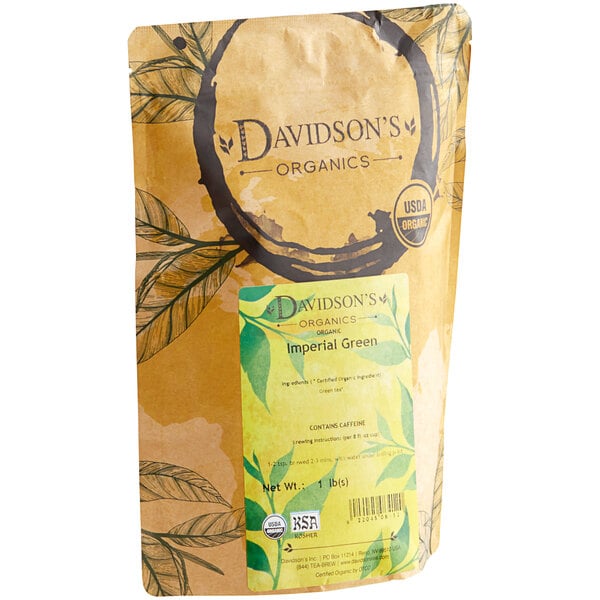 A brown bag of Davidson's Organic Imperial Green Loose Leaf Tea with a label showing green leaves.