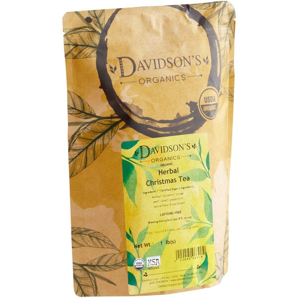A package of Davidson's Organic Christmas Herbal Loose Leaf Tea with a label.