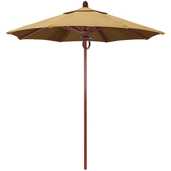 A wheat colored California Umbrella with a red oak pole.