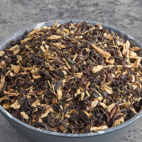 A bowl of Davidson's Organic Ginger Chai Loose Leaf Tea.