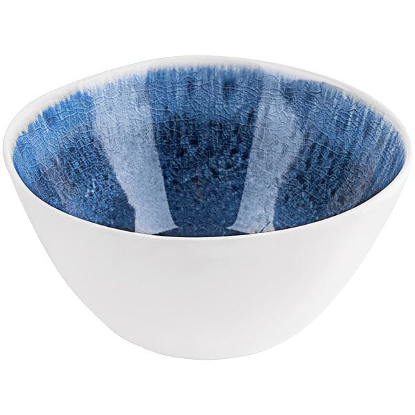 A white bowl with blue and white speckled design.