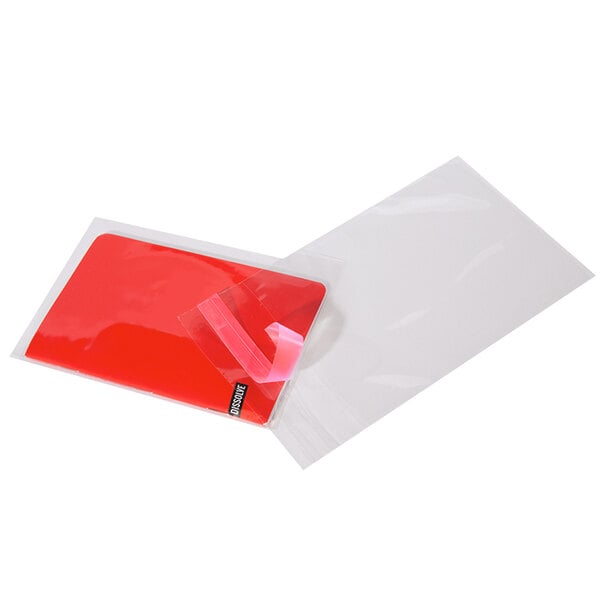 A clear rectangular poly bag with tape on it.