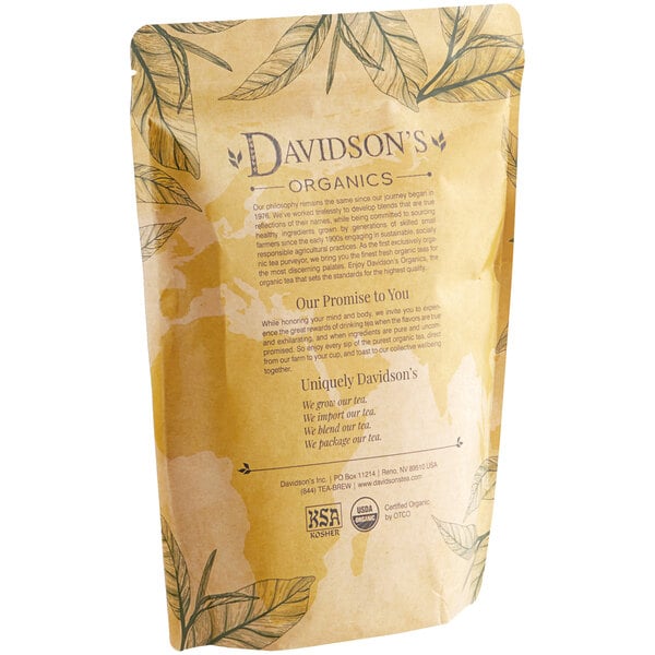 A brown Davidson's Organic Lemon Essence with Peel Loose Leaf Tea bag on a counter.