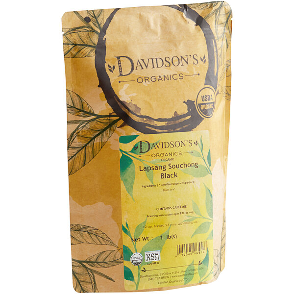 A brown bag of Davidson's Organic Lapsang Souchong Black loose leaf tea with a label showing green leaves.