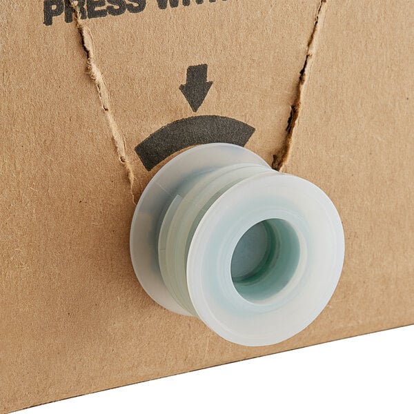 A white box with a Mountain Dew logo and a white plastic seal.