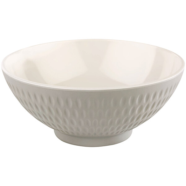 A cream melamine bowl with a textured pattern.